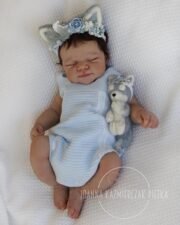Lifelike full body silicone reborn baby dolls handcrafted by internationally acclaimed artist Joanna Kazmierzak Pietka showing realistic newborn skin texture weight and extraordinary detail