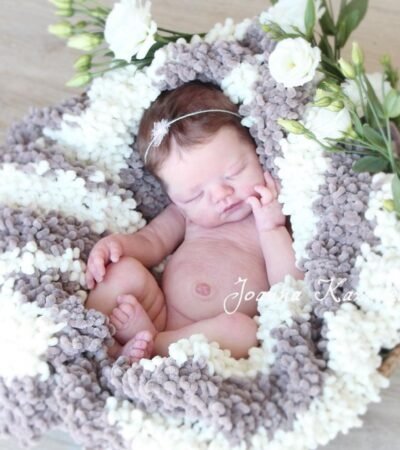 ​Full body silicone doll Monday with dark rooted hair