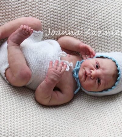​Full body silicone doll Jude sleeping in blue outfit