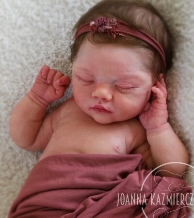 Full body silicone doll Joanna Joy smiling in outfit
