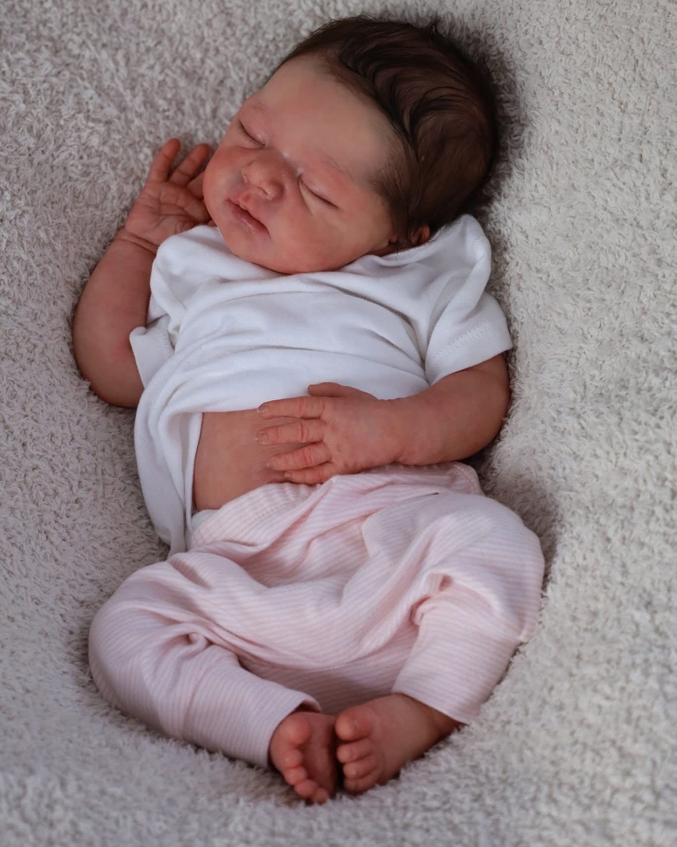 joanna_kazmierczak_-20250124-0003.jpg Meet Baby Raleigh! Stunning Marshmallow blend finish, rooted brown hair, 9lbs, full silicone. Already bathed & ready to fly home. Limited Edition